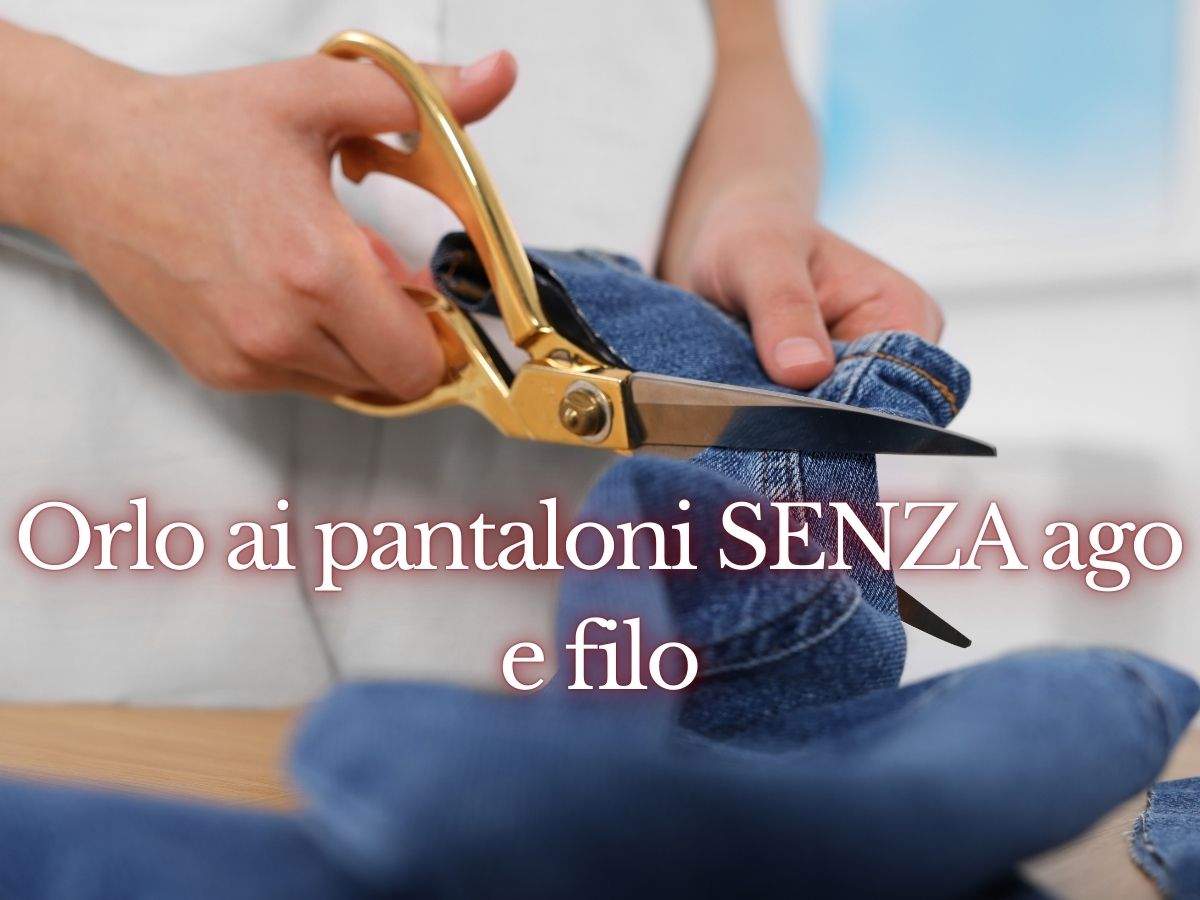 sarta taglia orlo a un pantalone jeans