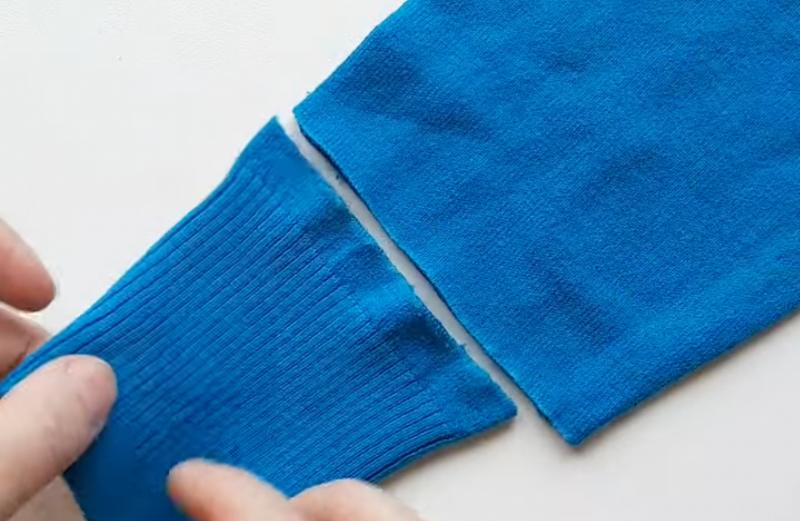 manica tagliata e divisa dal suo polsino