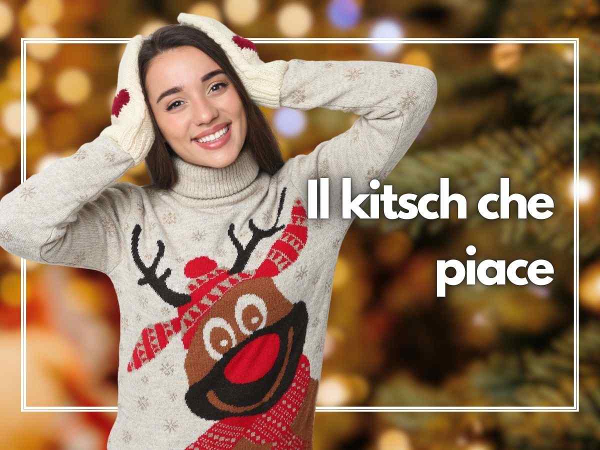 donna sorride con maglione di natale