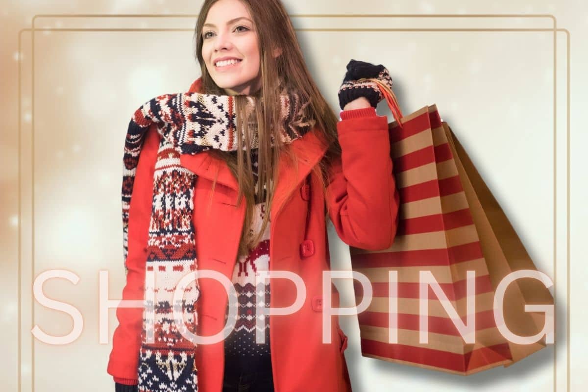 Donna con booster shopping