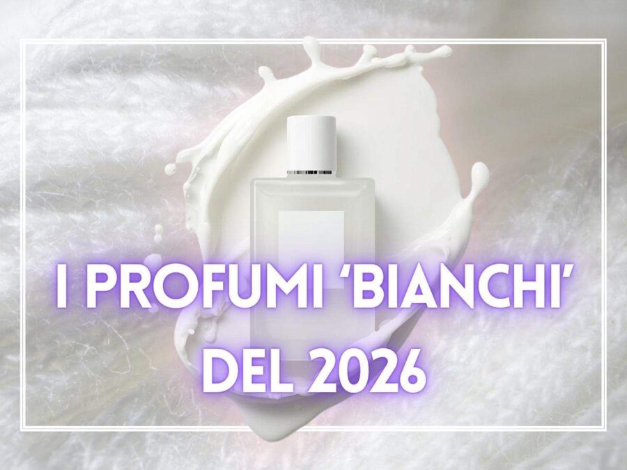 boccetta di profumo con latte intorno